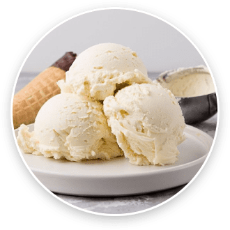 Three scoops of vanilla ice cream on a white plate with a waffle cone, against a light background.