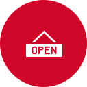 Red circular sign with a white border and a white stylized house icon above the word "open" in white capital letters.