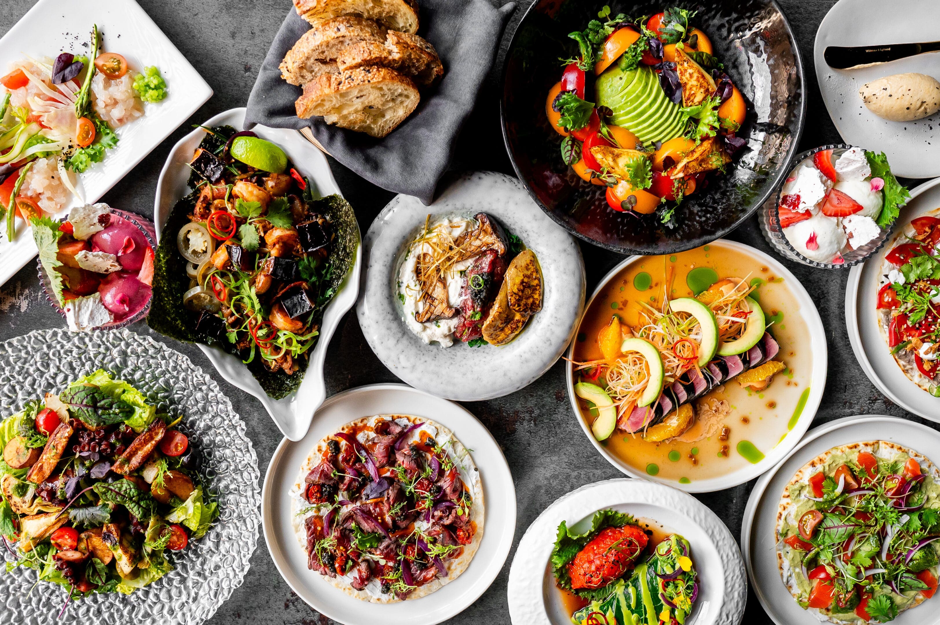 Assortment of colorful gourmet salads and dishes