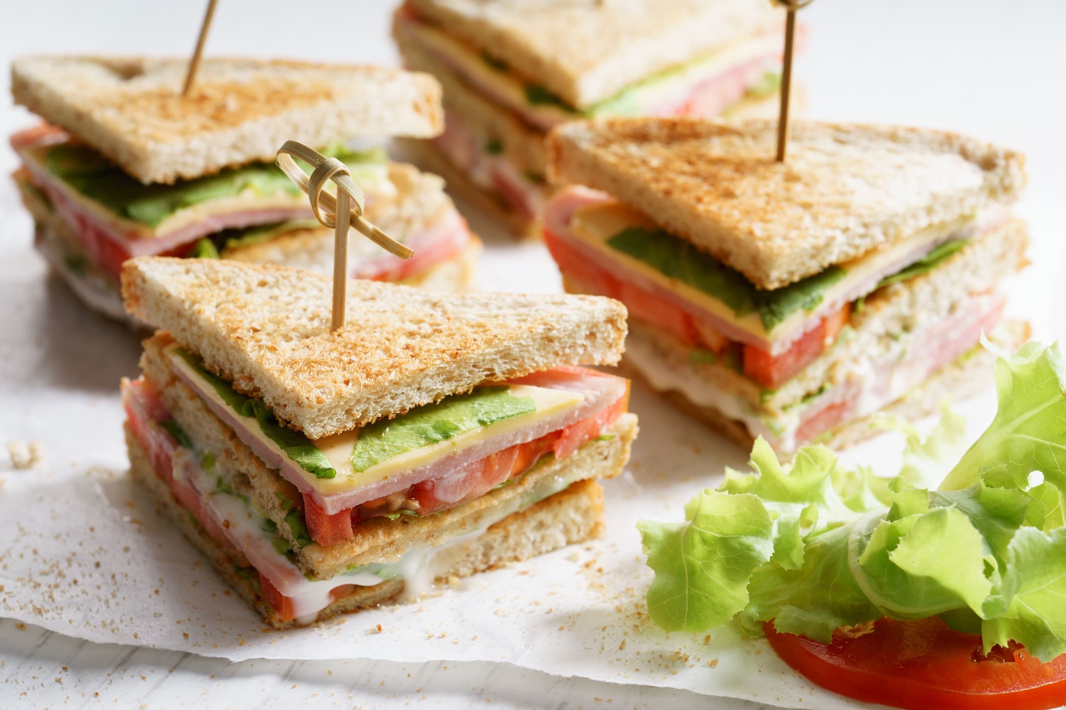 Triple-decker club sandwiches with toothpicks